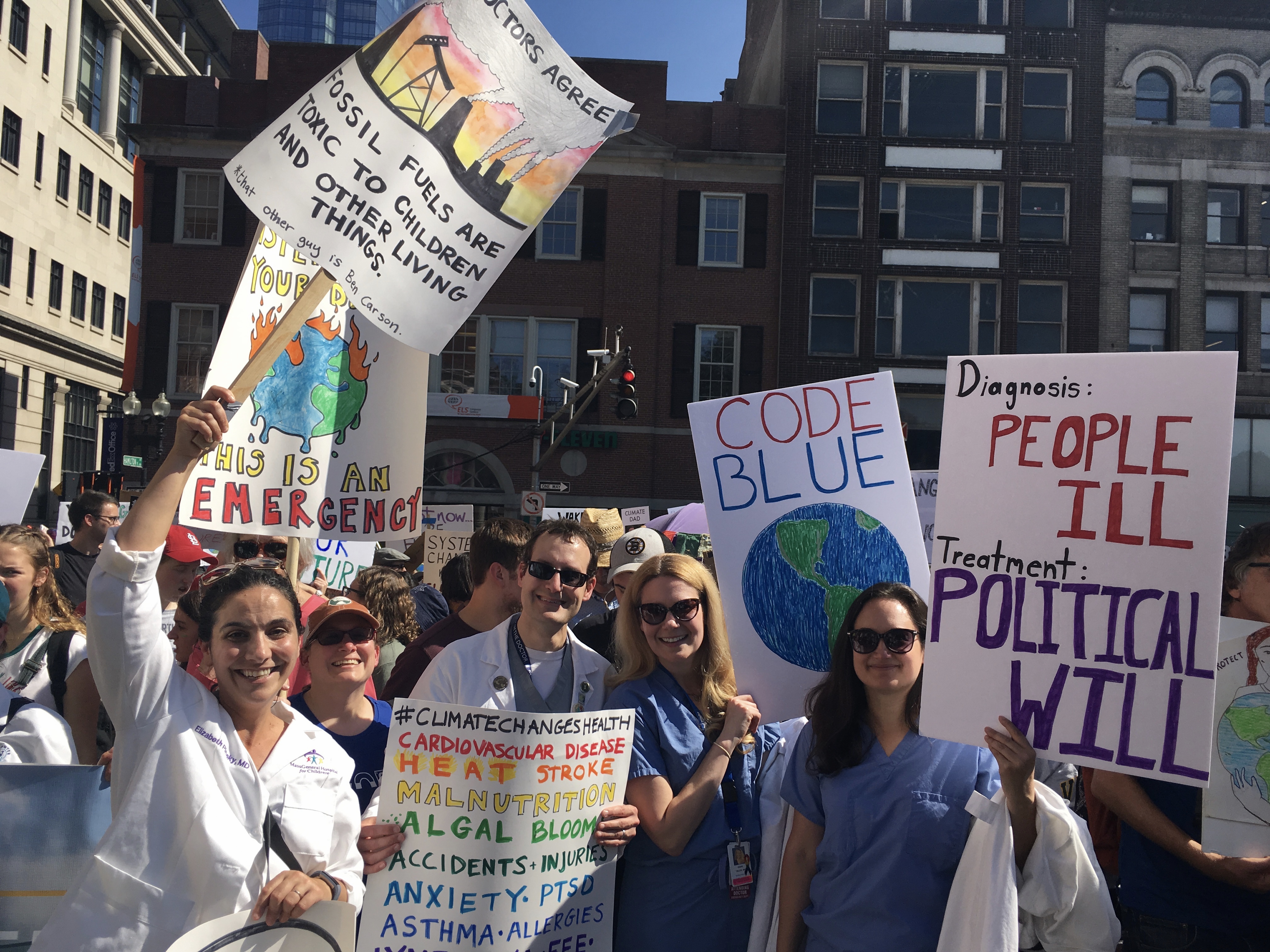 Climate strike doctors with signs