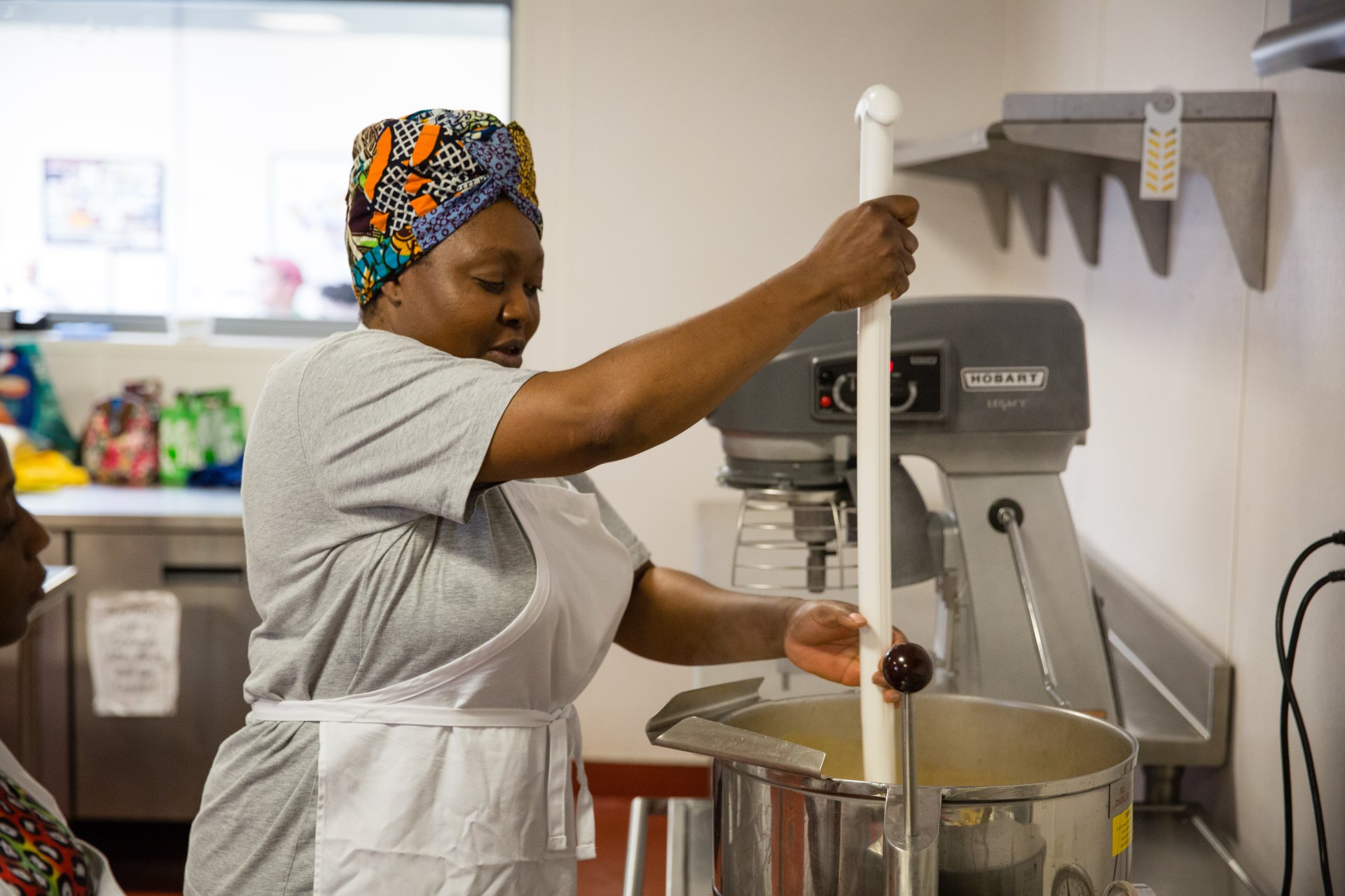 Paulette Ngachoko prepares food at her business Hapi African Gourmet